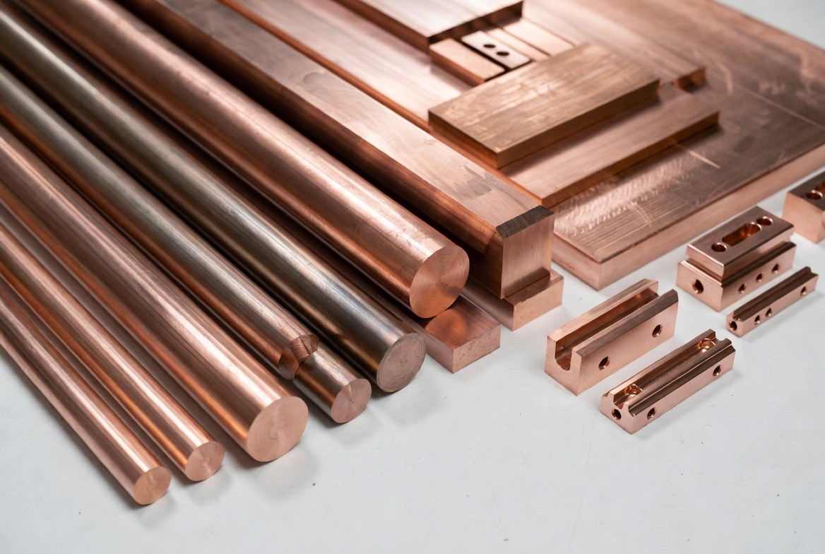 Cymber Metal catalog page featuring CuCrZr rods, plates, and custom machined parts